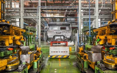 Stopped equipment with car frame at a closed car factory