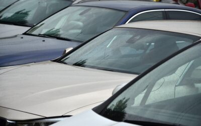 Roofs of several cars. A lot of cars stand close at rush hour